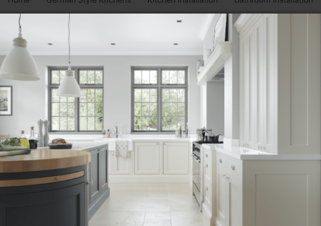 cream-shaker-kitchen-with-dark-green-island Where the Remodel Price Stops - Not Included / Costed Separately
