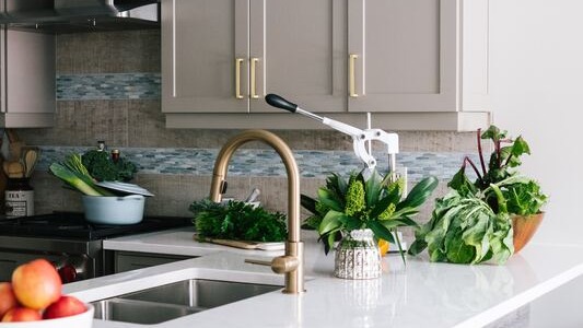 grey-cabinets-white-worktop-pendant-lights-16x9-1 Wooden Worktop Fitting Across Derby, Derbyshire And The Peak District Fringe