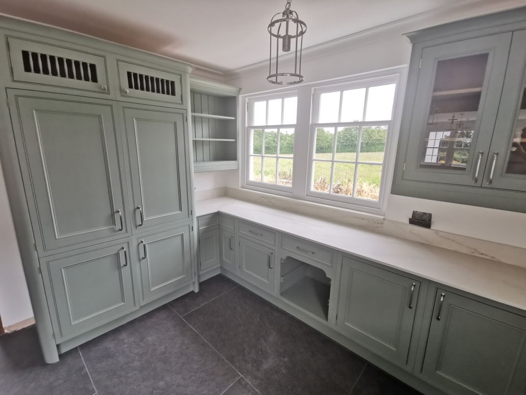 sage-green-spray-painted-fitted-cabinets Master Plasterers and a Written Guarantee, Not Just a Painter