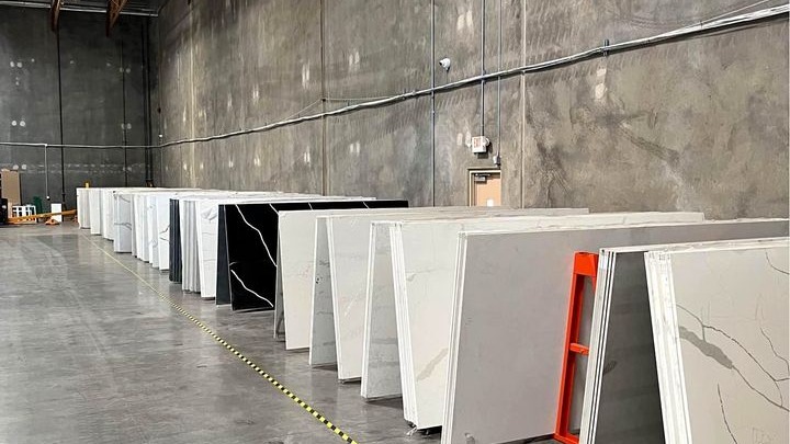 warehouse-row-of-quartz-worktop-slabs-16x9-1 What's Included When We Fit or Re-Profile Your Worktop Edge